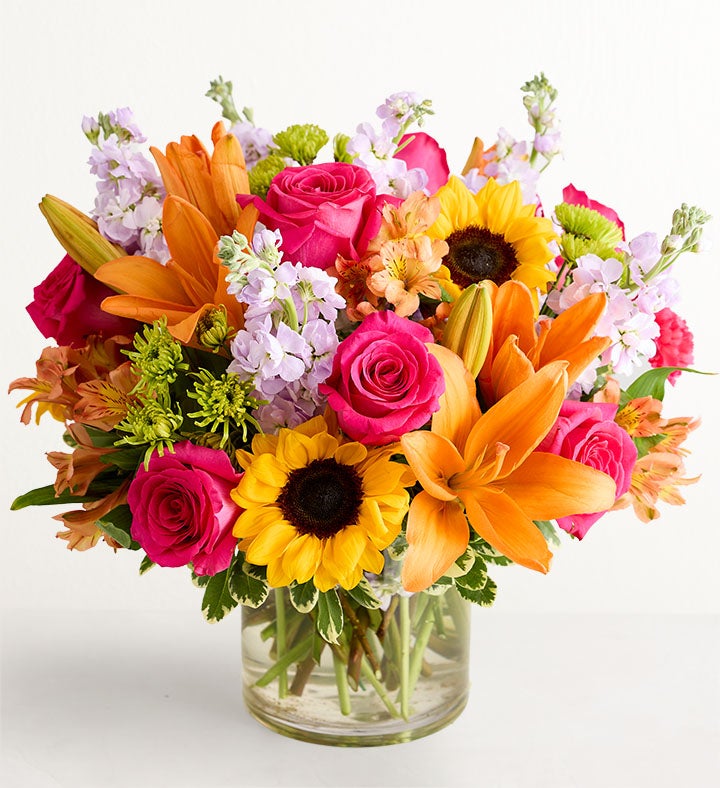 Colorful lily and sunflower arrangement